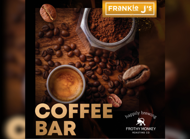 Espresso and coffee beans on a wooden surface with "COFFEE BAR" text and Frankie J's branding.
